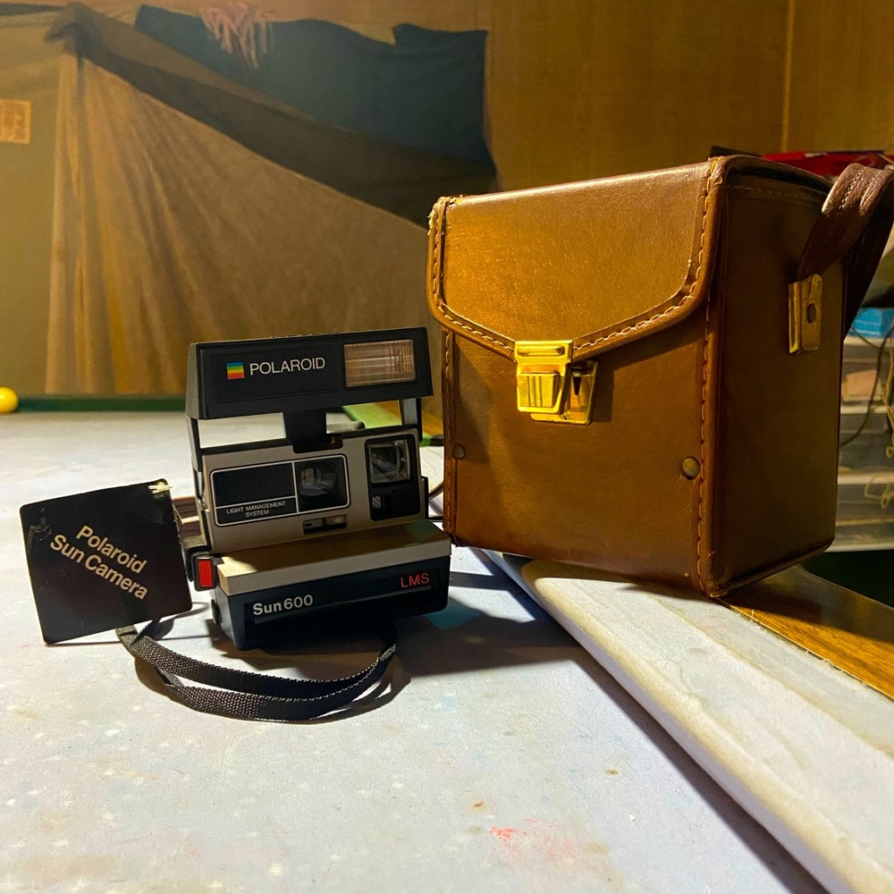 Polaroid 600 son still has tags on camera has case no firm 50 bucks